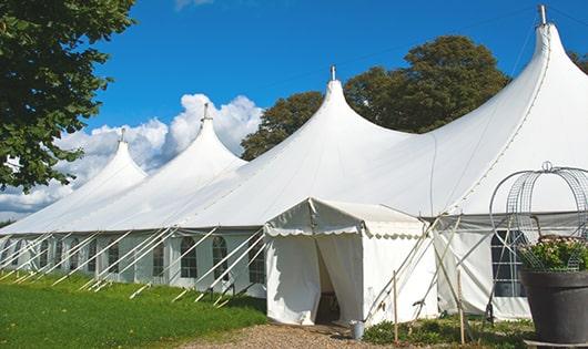 multiple portable restrooms for large-scale outdoor events, ensuring availability for all guests in Buckner